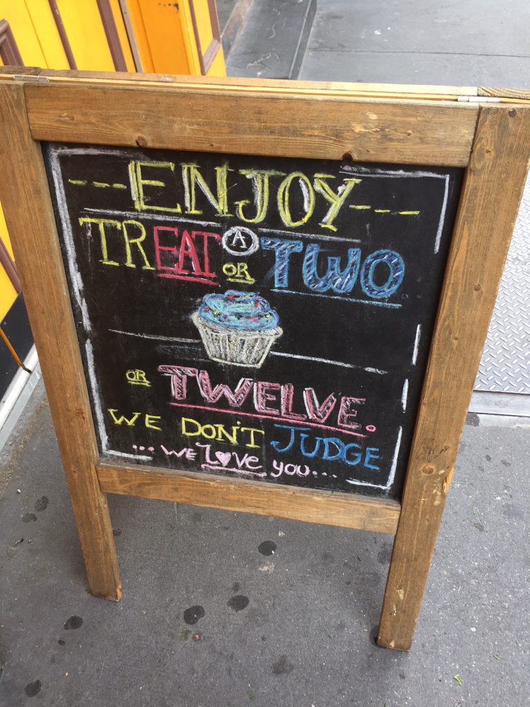 Sign outside Mollys Cupcakes in NYC